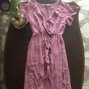 Pink dress with attached shorts.